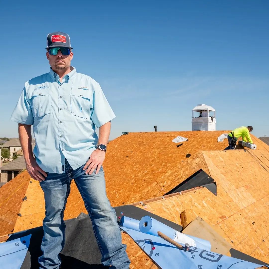 A Down South crew member on new roof decking